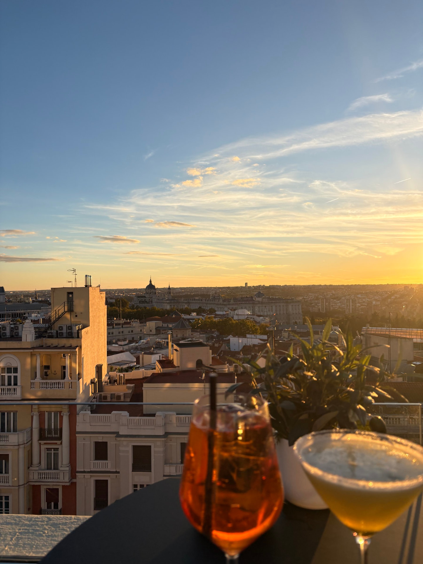 Drinks on a rooftop at sunset