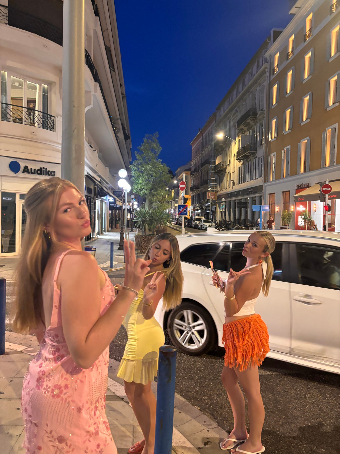 Friends out on a city street at night